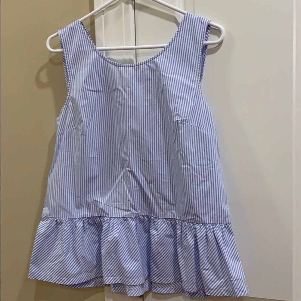 Ladies peplum sleeveless top